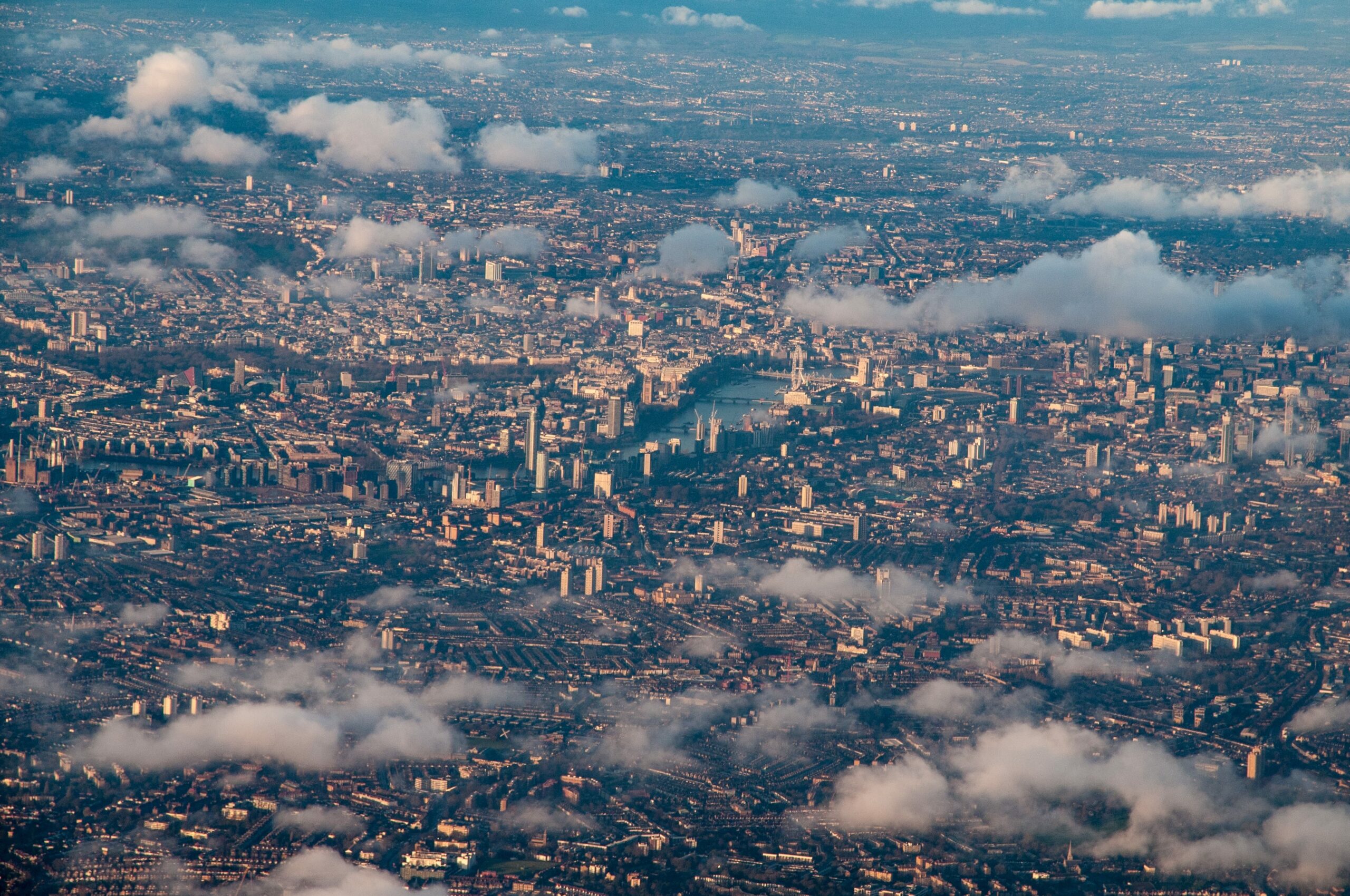 aerial view central london through clouds